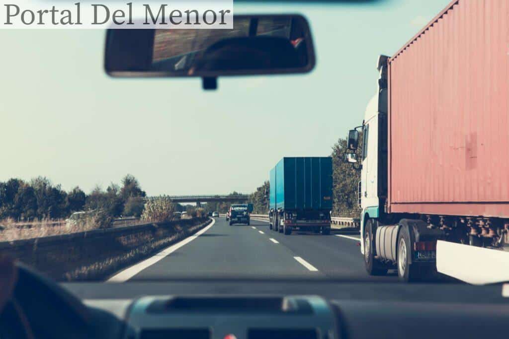 Blue and Red Freight Truck on Road