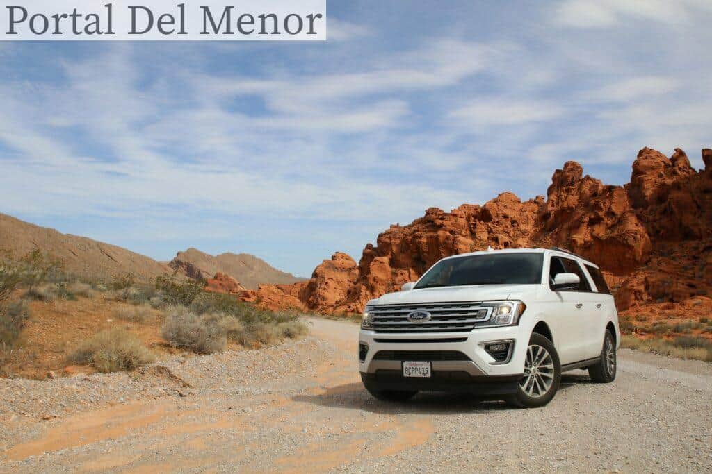 parked white Ford Explorer SUV