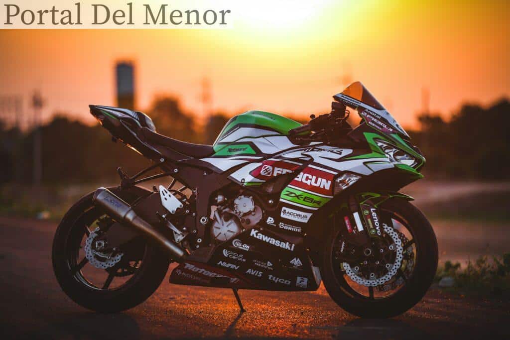 black and green sports bike on road during sunset